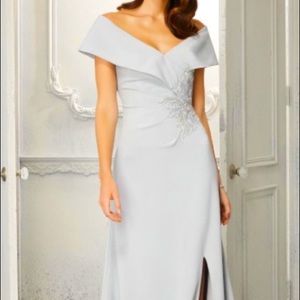 NEVER WORN. Silver, size 16, Madeline Gardner New York Evening Gown.